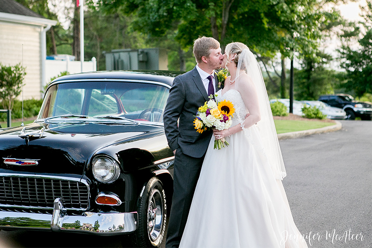 bride and groom couple in front of vintage car